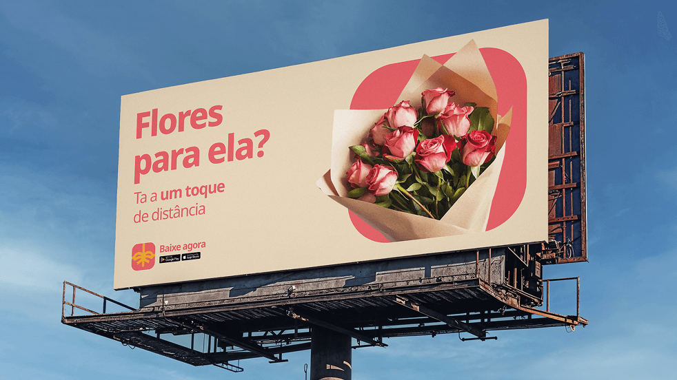 Um outdoor com a chamada “Flores para ela? Tá a um toque de distância”
